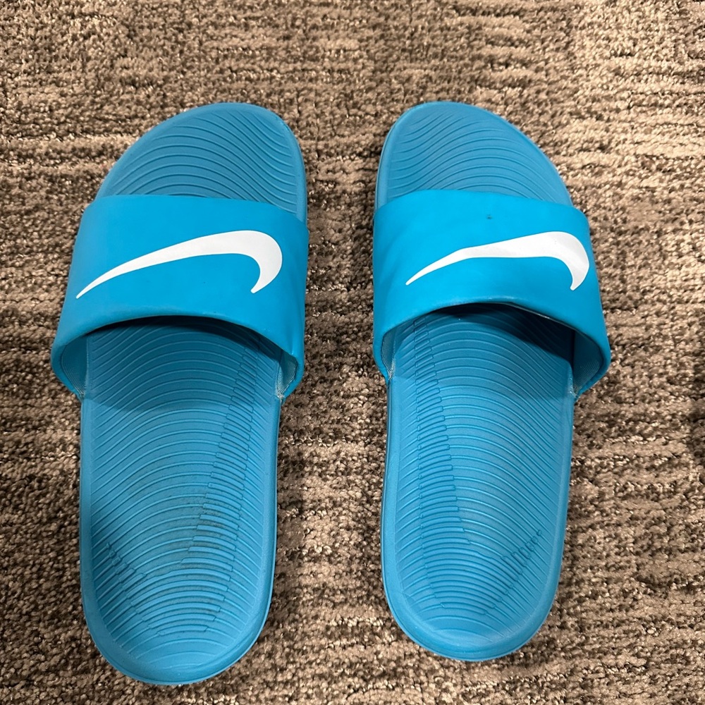 2 pairs of Nike slides Aqua Blue Slides and Black Slides